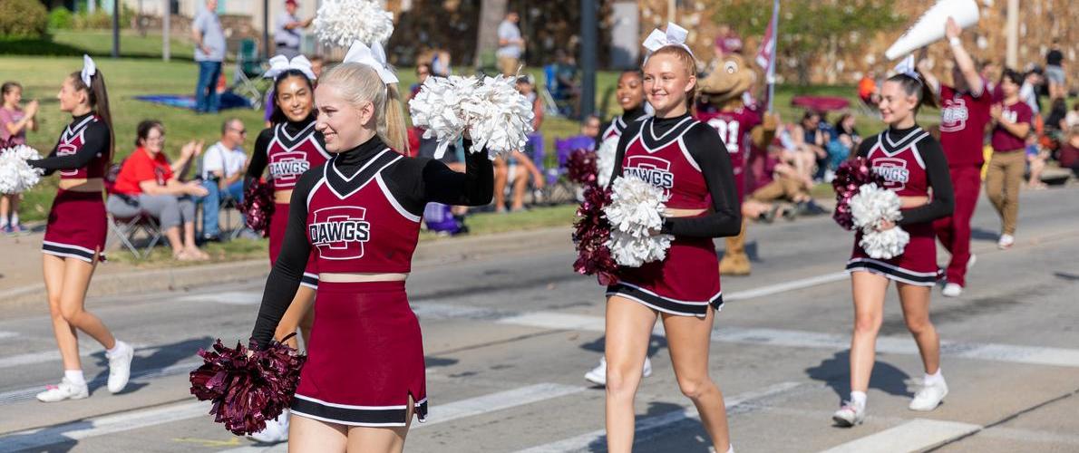 cheerleaders walking in hoco parade