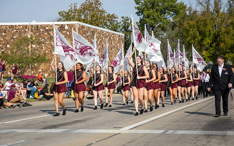 SIU Flags team walking in the Homecoming Parade